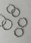 Earrings Pack of three pair Hoop fastening Silver-toned Each style differs