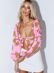 Long sleeve crop top Princess Polly Exclusive Printed design  Can be worn on or off the shoulder  Elasticated edges  Tie front fastening  Puff sleeves 