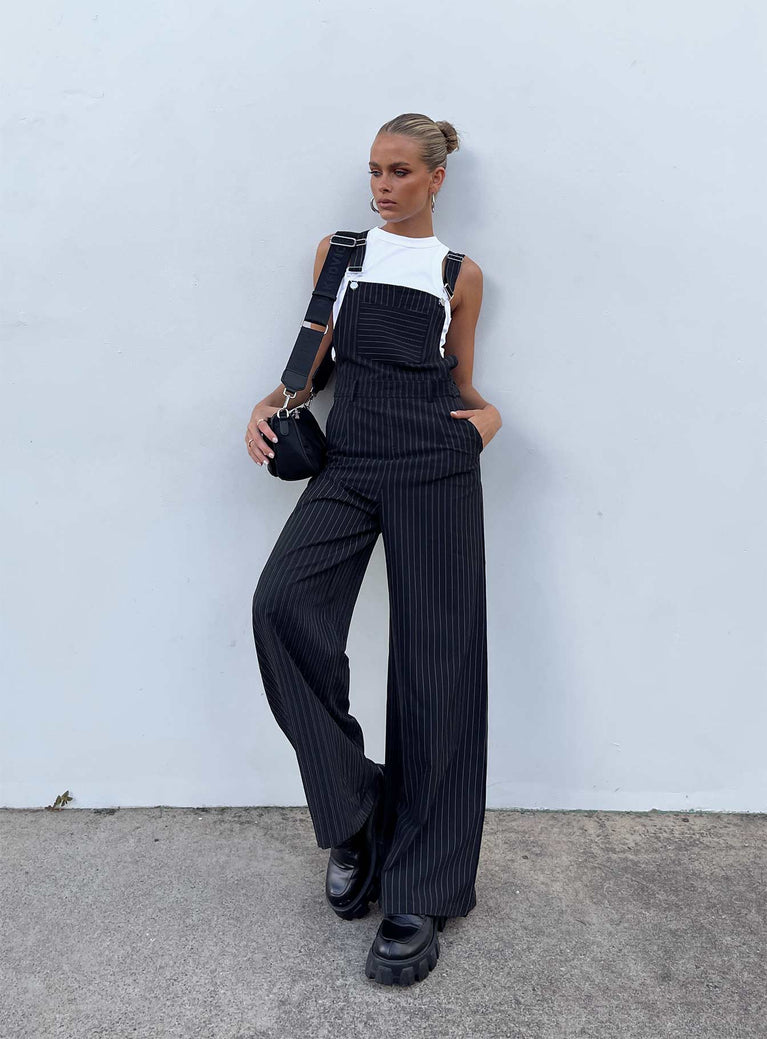 Overalls Oversized fit Pinstripe print  Adjustable shoulder straps  Single chest pockets  Belt looped waist  Four classic pockets  Invisible zip fastening at side  Wide leg 