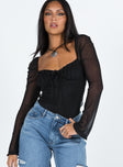 Long sleeve black bodysuit slim fitting Mesh material Ruches bust Exposed back Twin tie fastening at back High cut leg Cheeky style bottom Press clip fastening