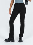 Black slim fitting pants High rise Zip and button fastening Invisible zip at cuff Good stretch