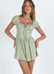 Green romper Cap sleeve  Ruched bust  Tie detail Shirred back band  Invisible zip fastening at side Boning through front Ruched waist