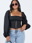 Crop top Long sleeve Zip back Structured waist design with boning Lace up detail Textured bust Square neckline Puffed long sleeves