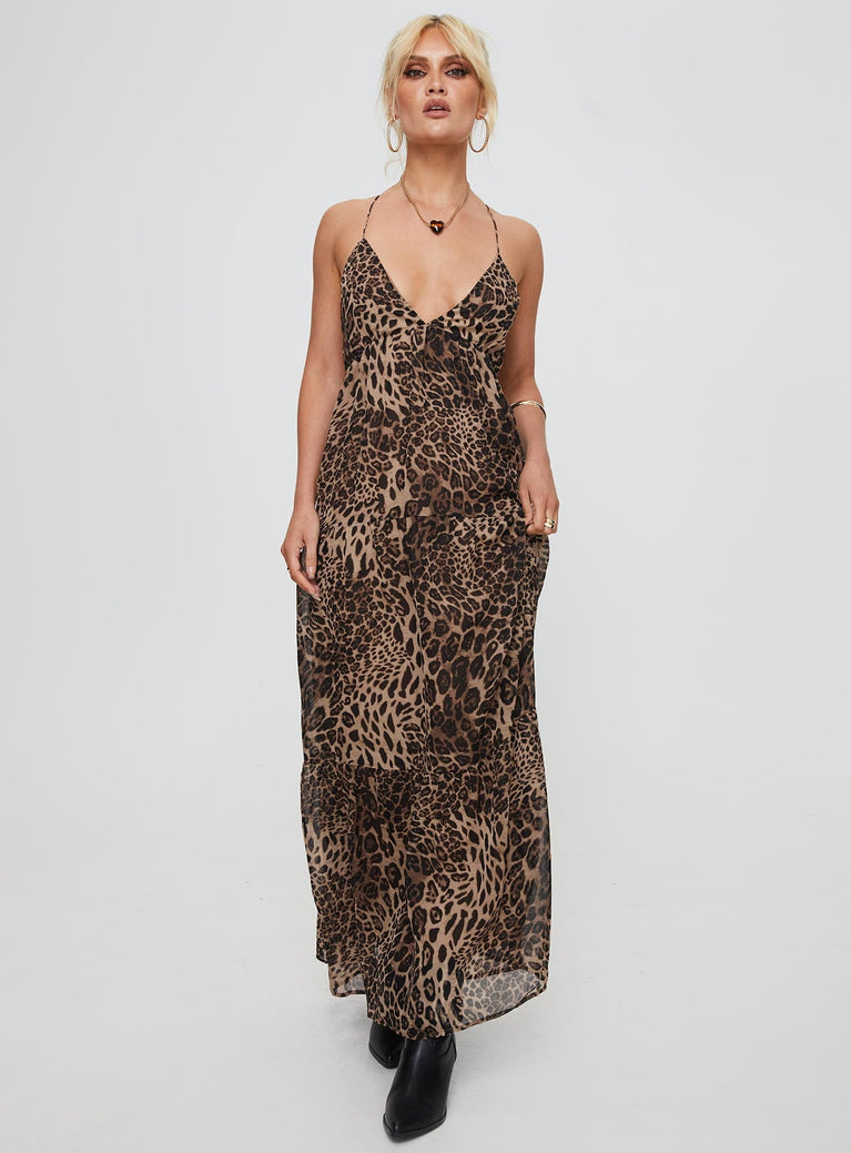 Leopard print maxi dress V-neckline, adjustable shoulder straps with tie fastening, invisible zip fastening at side, tiered design