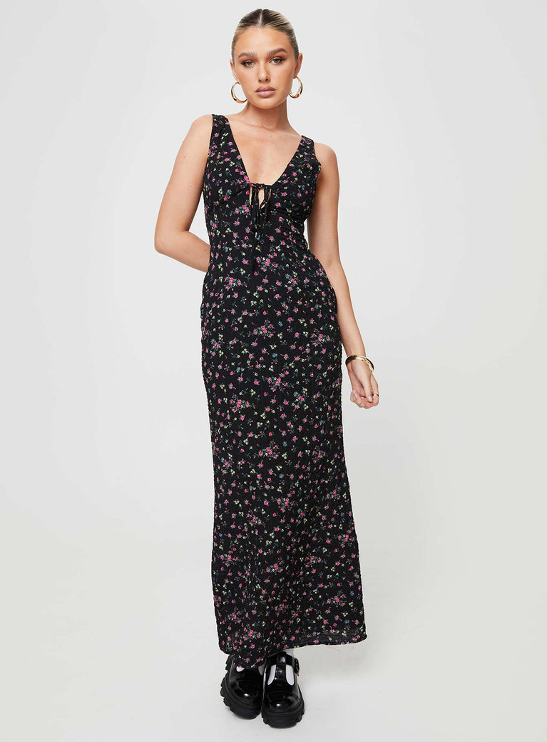 Floral print maxi dress V-neckline, fixed shoulder straps, tie detail at bust, invisible zip fastening Non-stretch material, partially lined