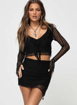 Matching set Slim-fitting long-sleeve crop top, V-neckline, lace material, ruffle detailing Slight stretch, lined body  Slim-fitting mini skirt, asymmetric lace hem Elasticated waistband