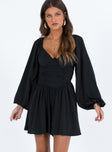 Black romper Balloon style sleeve  Wired cups Ruching throughout Boning at side Elasticated bands at back