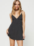 Polka dot print mini dress V neck, gathered detail at bust, adjustable shoulder straps, tie fastening at back, elasticated back