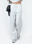 Track pants Elasticated drawstring waist  Twin hip pockets  Wide leg  Soft lining 