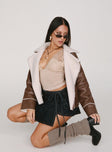 Jacket Faux leather material Faux fur lining Silver-toned hardware Classic collar Zip fastening at front Twin hip pockets