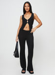 Rib-knit matching set Vest top, v-neckline, button fastening at front, split hem High-rise pants, elasticated waistband, straight leg