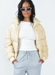 Two in one puffer jacket and vest High neck  Zip front fastening  Twin hip pockets  Drawstring waist 