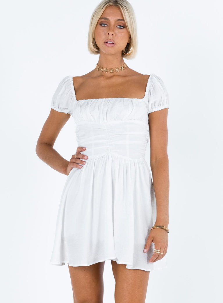 White mini dress Cupro material Puff sleeve Square neckline Ruching throughout Invisible zip fastening at back