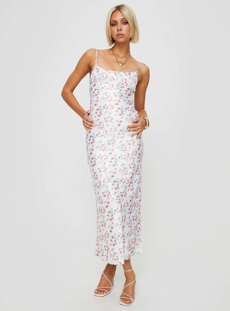 Floral maxi dress Adjustable shoulder straps, scooped neckline, invisible zip fastening Non-stretch material, unlined