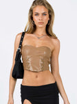 Strapless top Faux leather material Sweetheart neckline Inner silicone strip at bust Lace-up detailing Zip fastening at back