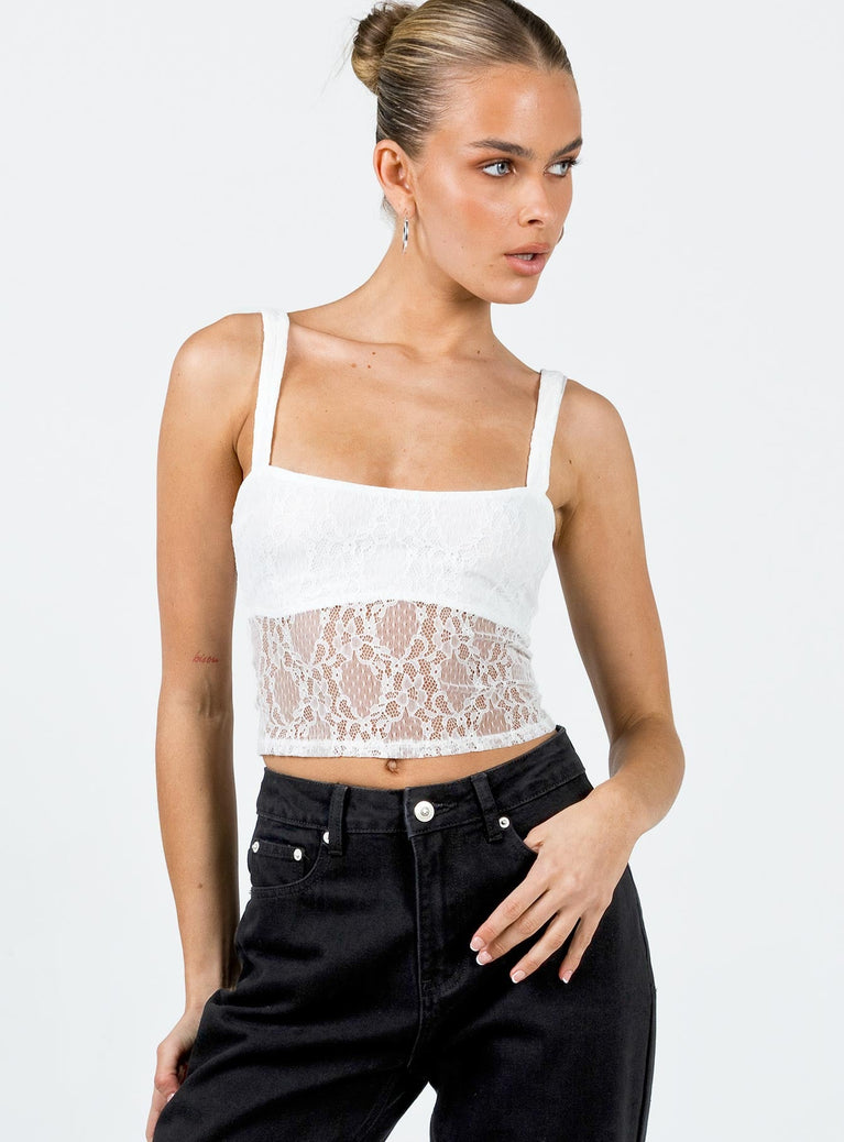 Crop top Lace material Fixed straps Scooped neckline Good stretch Mesh lined bust