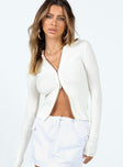 Long sleeve white top Soft ribbed material Classic collar Double zip front fastening