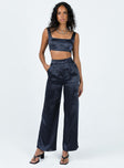 Matching set Soft silky material Crop top Fixed straps Invisible zip fasting at side High waisted pants Wide relaxed leg Belt loops at waist Zip & button fastening Lined top