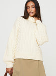 Turtle neck cable sweater Drop shoulder, ribbed cuff and waistband Good stretch, unlined 