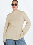 Sweater Ribbed material Mock neckline Splits at side hem Flared cuff