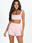 Matching set Crop top Fixed straps Invisible zip fasting at side High waisted shorts Belt loops at waist Zip and button fastening Subtle pleats at waist Twin hip pockets