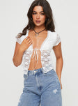 Lace crop top Plunging neckline, tie fastening at bust, pointed hem