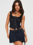 Corset top  Dark denim wash, contrast stitching, V- shape hem, fixed straps Button fastening at front