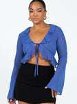 Blue long sleeve top Sheer material Frill neckline & hem Tie fastening at bust Flared sleeves Non stretch Unlined