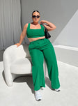 Matching set green Crop top Fixed straps Invisible zip fasting at side High waisted pants Wide relaxed leg Belt loops at waist Zip & button fastening