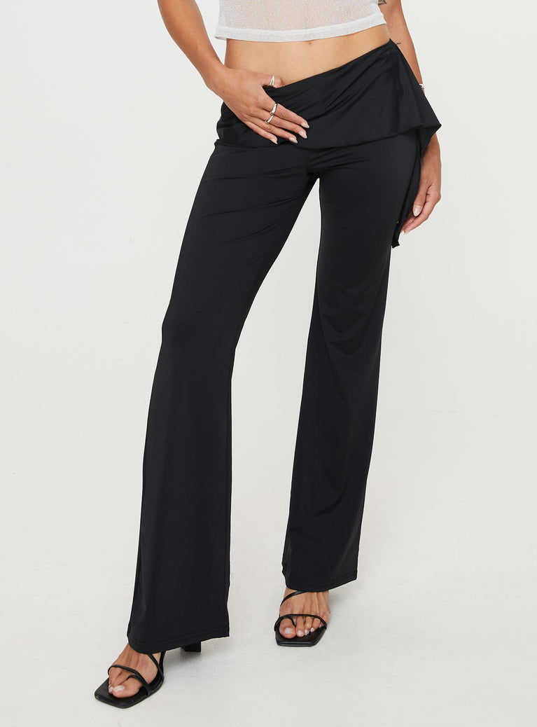 Pants Low-waisted, frill detail-lettuce trim on waits, slightly flared  Elasticated waist 