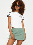 Skort Slim fitting, low rise Invisible zip fastening at back, built-in shorts, slit at side Non-stretch, fully lined