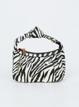 Bag Zebra print Single handle Removable chain shoulder strap Removable leather crossbody strap Pleated deatil Zip fastening One main compartment