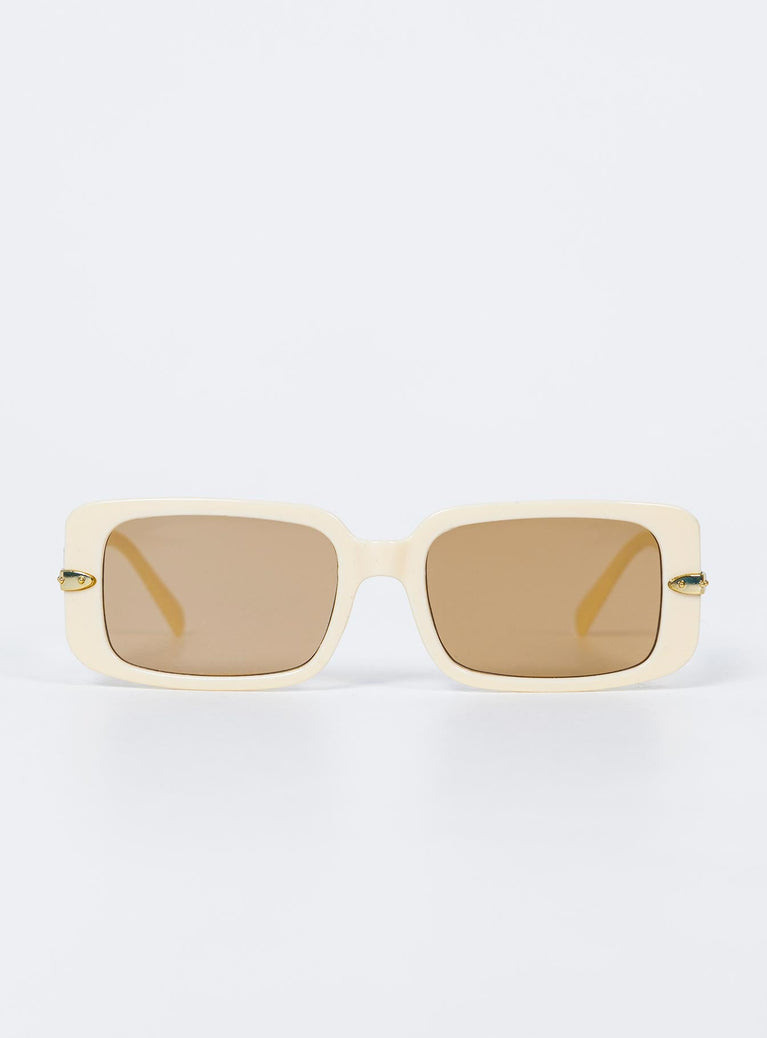 Sunglasses UV 400 Oversized style Rectangle frame Gold-toned detail on arms Moulded nose bridge Beige tinted lenses Lightweight