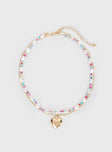 Gold-toned necklace Bead detail, heart pendant, two fixed chins - these cannot be worn separately, lobster clasp fastening