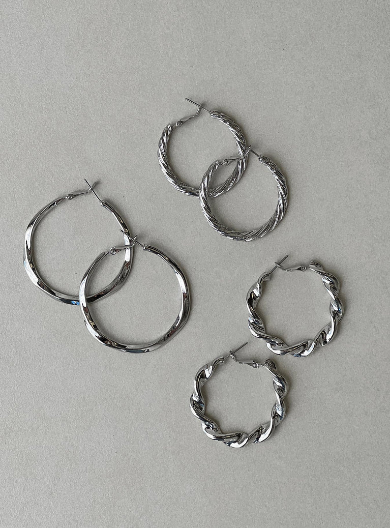 Earrings Pack of three pair Hoop fastening Silver-toned Each style differs