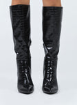 Boots Faux croc leather  Knee-high  Stilleto style heel Pointed toe  Padded inside 