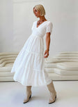 White maxi dress Puff sleeve V neckline Tie fastenings at back Shirred band at back Tiered skirt