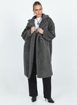 Coat Collared neckline Front button fastening Twin side pockets