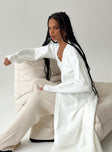 White cardigan Knit material Longline design Open front Ribbed cuffs Good stretch Unlined