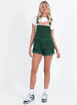 Khaki overalls Cord material  Adjustable shoulder straps  Button fastening at hips  Chest pocket 