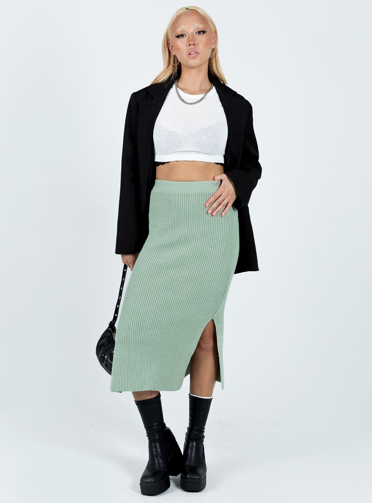 Midi skirt Soft knit material  Elasticated waistband  Side slits 