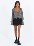 Grey long sleeve top Sheer design  Wide neckline  Detailed trimming  Button front fastening  Tie fastening at cuffs