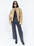 Aviator jacket Faux fur material  Large collar  Bucket fastening at neckline Zip front fastening  Twin hip pockets  Buckles at hem 