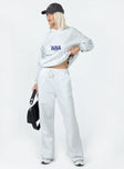 Track pants Elasticated drawstring waist  Twin hip pockets  Wide leg  Soft lining 