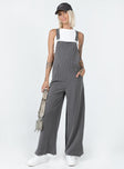 Overalls Pinstripe print  Adjustable shoulder straps  Chest pocket  Belt looped waist  Invisible zip fastening at side  Four-pocket design  Wide leg 