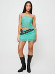 Matching lace set Strapless top, elasticated band at bust, asymmetric hem Low rise mini skirt