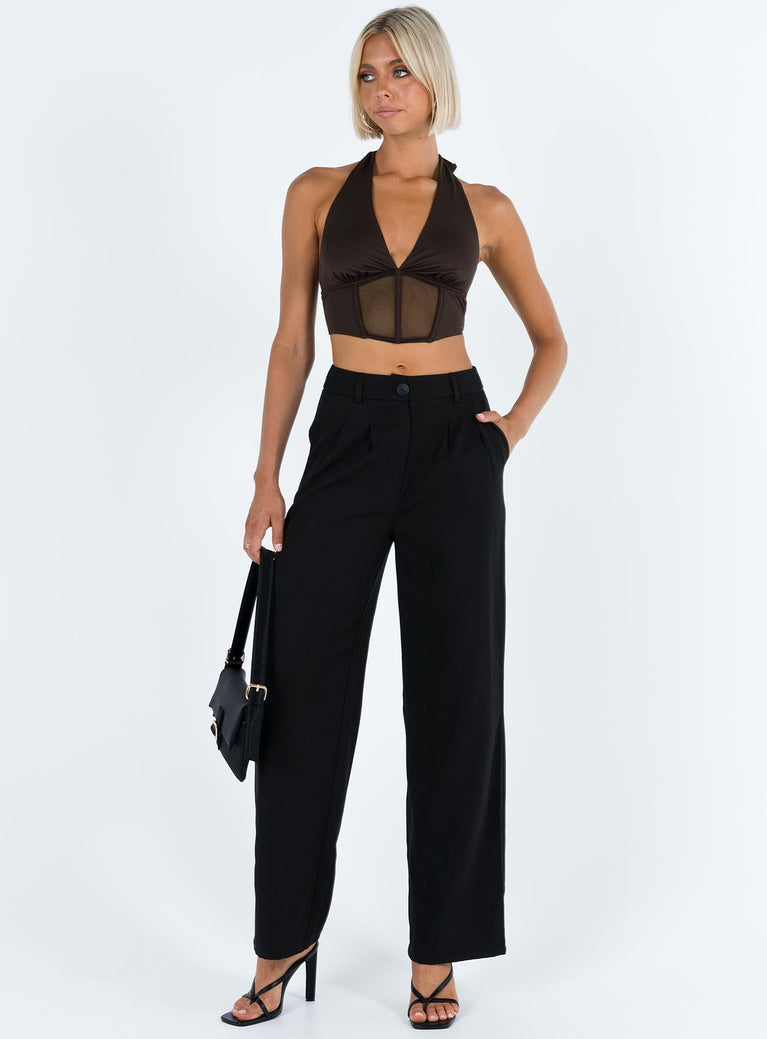 Crop top Sheer mesh material  Halter neck tie fastening  Plunging neckline Boning through waist  Good stretch   Lined bust 