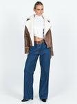 Jacket Faux leather material Faux fur lining Silver-toned hardware Classic collar Zip fastening at front Twin hip pockets