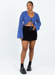 Blue long sleeve top Sheer material Frill neckline & hem Tie fastening at bust Flared sleeves Non stretch Unlined