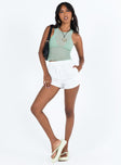 White shorts Broderie anglaise material Thick elasticated waistband Twin hip pockets